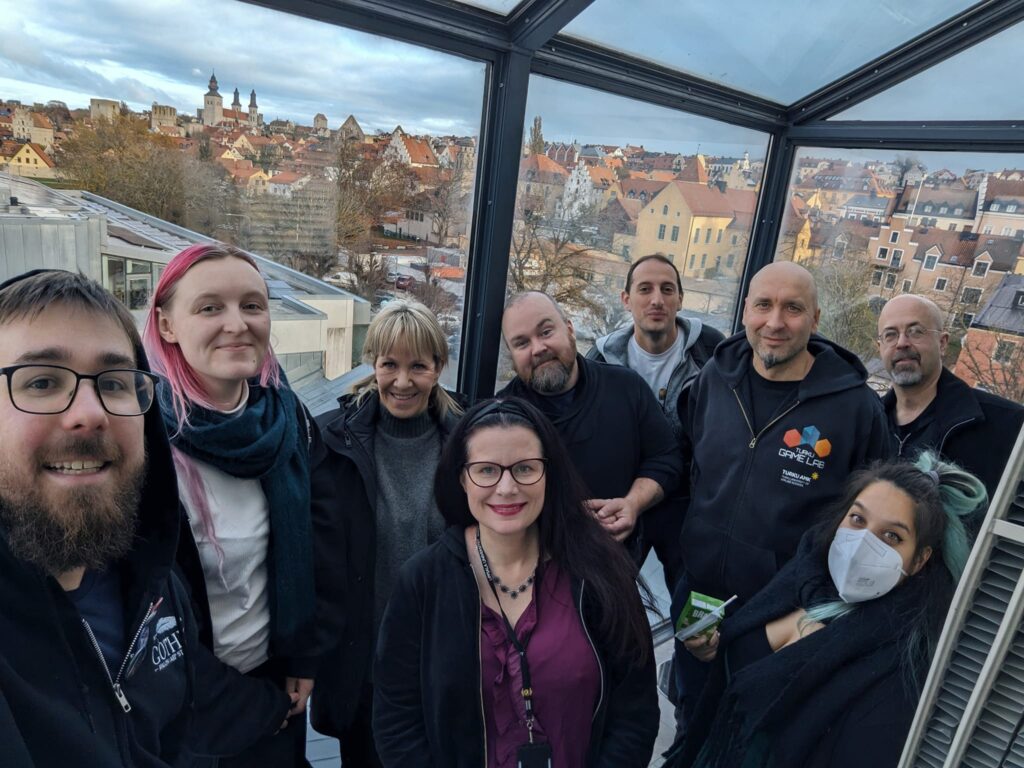 Erasmus EDGE members by a window overlooking Visby